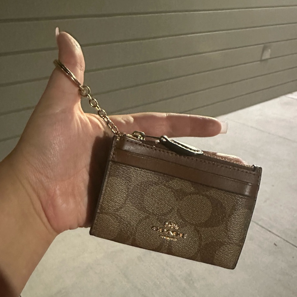 Coach mini skinny id case in signature canvas gold/khaki saddle 2. Lightly worn